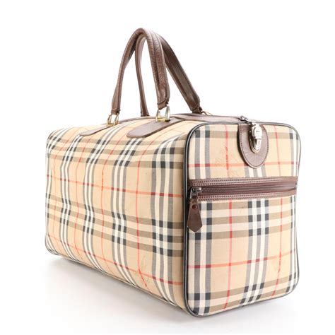 travel handbags burberry|Burberry check and leather bag.